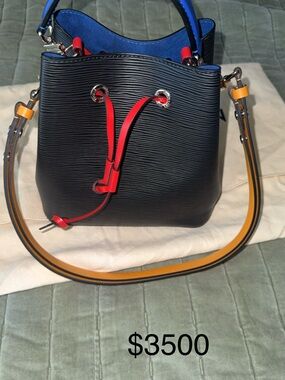 Louis Vuitton Black Bucket Bag with Red Drawstring and Yellow Strap
